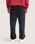 Heavy Essential Sweatpants | Black - Rückansicht mit lockerer Passform und stylischem Design.