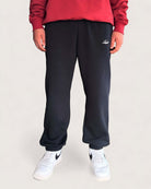 Heavy Essential Sweatpants | Black, Loose Fit 330 GSM, comfy wearing, featuring embroidered logo, fair produced.