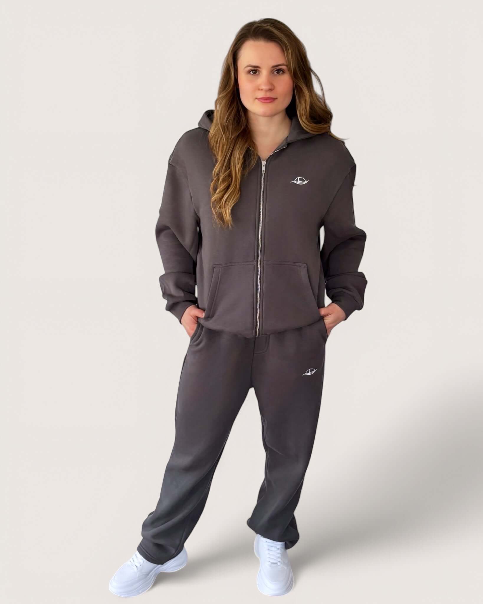 Heavy Essential Zip Hoodie | Graphite worn by a model, showcasing comfort and style in an oversized fit.