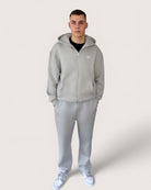 Hellgrauer Zip Hoodie mit weißer Rose als großen Backprint und weißem Logostick vorne, Zip Hoodie von Spirit of Departure, Streetwear für Herren von Spirit of Departure, Zip Hoodie in Light Grey von der Black & White Roses Collection, dicker Stoff, high quality
